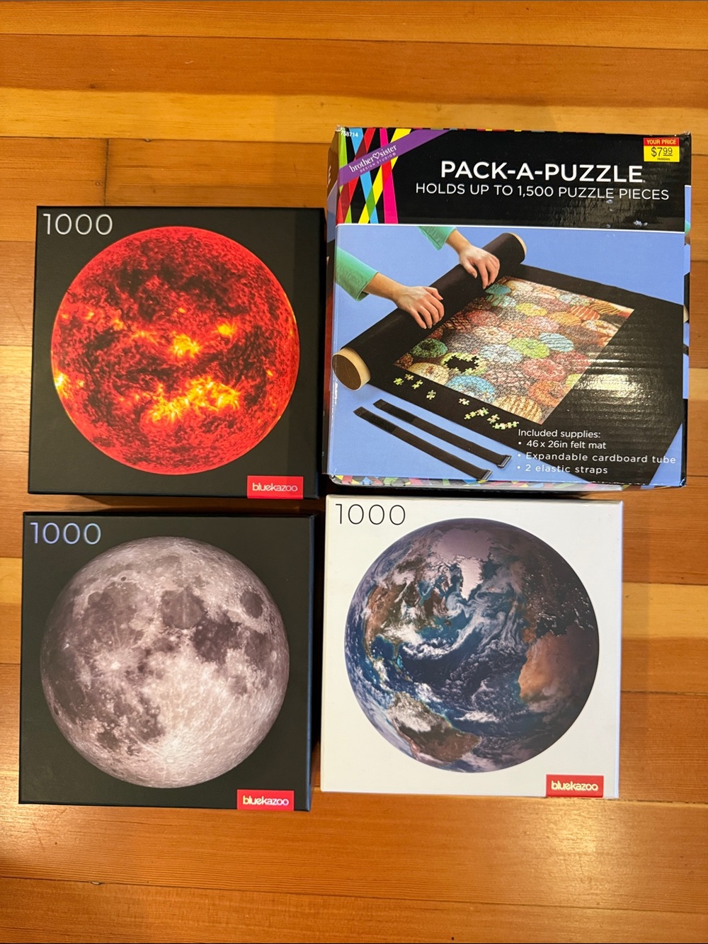 Blue Kazoo 3 puzzles with high-resolution images of the Sun, Earth, and Moon
